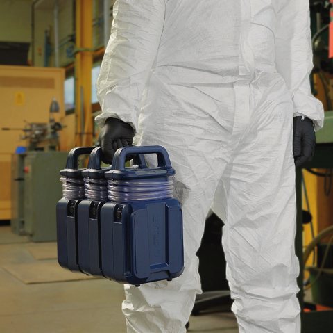 Operator in protective clothing carrying interlocked Vortex3 pumps